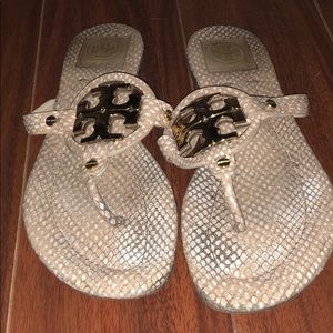 Nude and white Tory Burch flip flop sandals